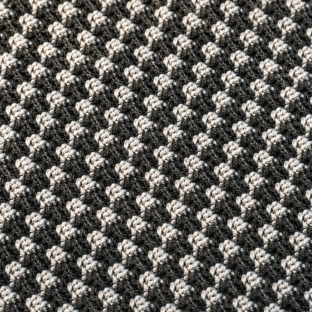 Makro detail vaflové vazby ručníku Kōji Face Towel