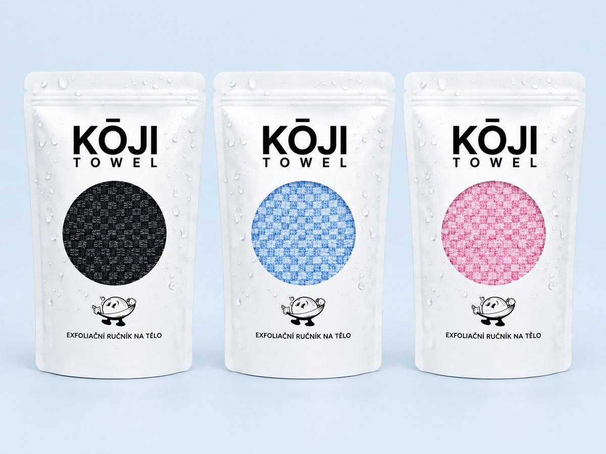 Tři barvy exfoliačního ručníku Kōji: černá, modrá a růžová.